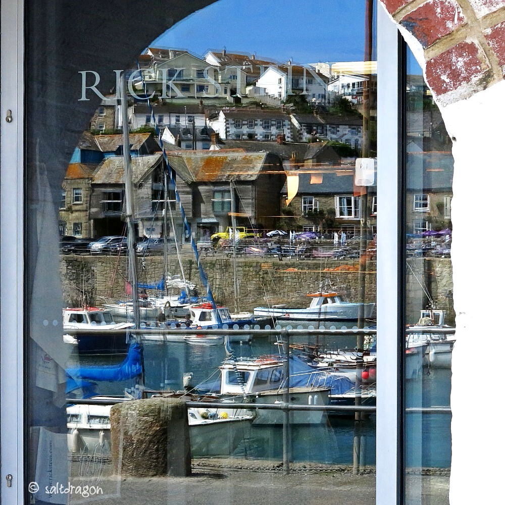 saltdragon_com's tweet photo. Porthleven harbour looking great reflected in the door to @SteinPorthleven yesterday. Beautiful day in #Cornwall #photography https://t.co/fcDeg3YbgI