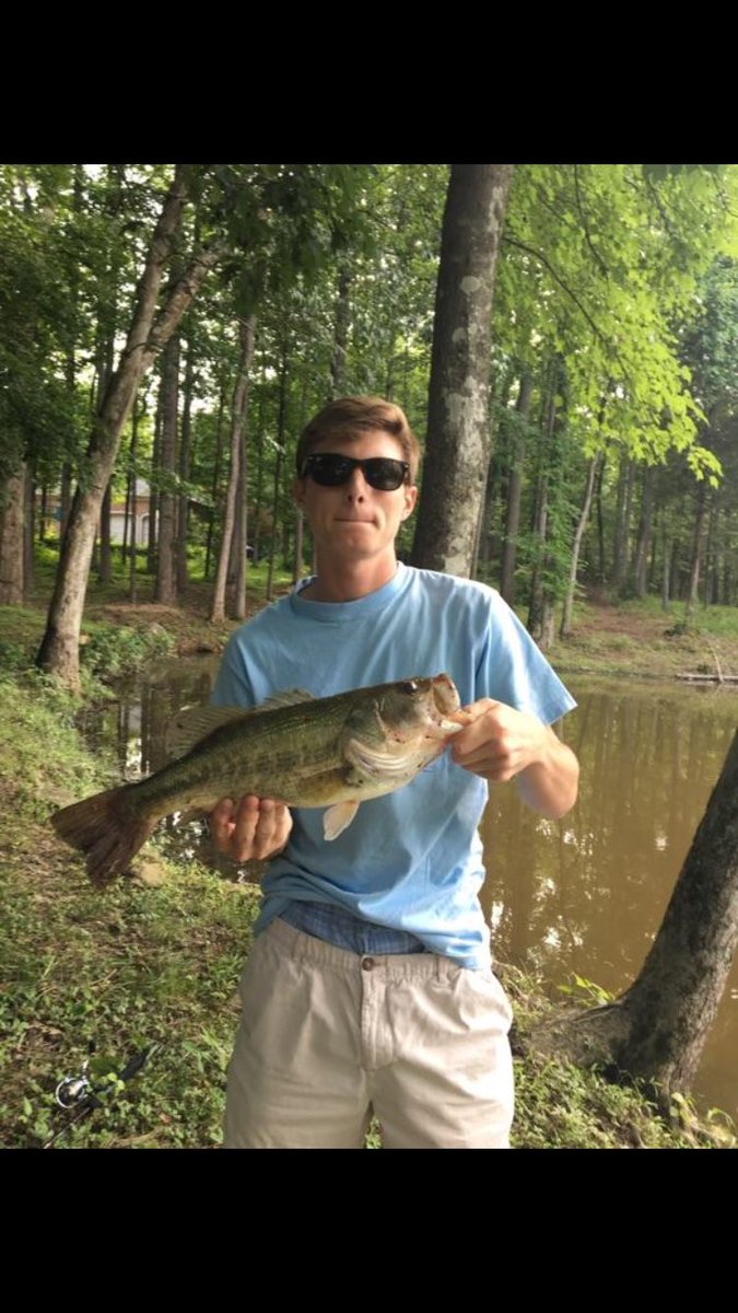 WHSbass's tweet image. Senior member, Kaison King, sizing up his new catch next to his rod and reel. #bassfishing #aquaticconservation