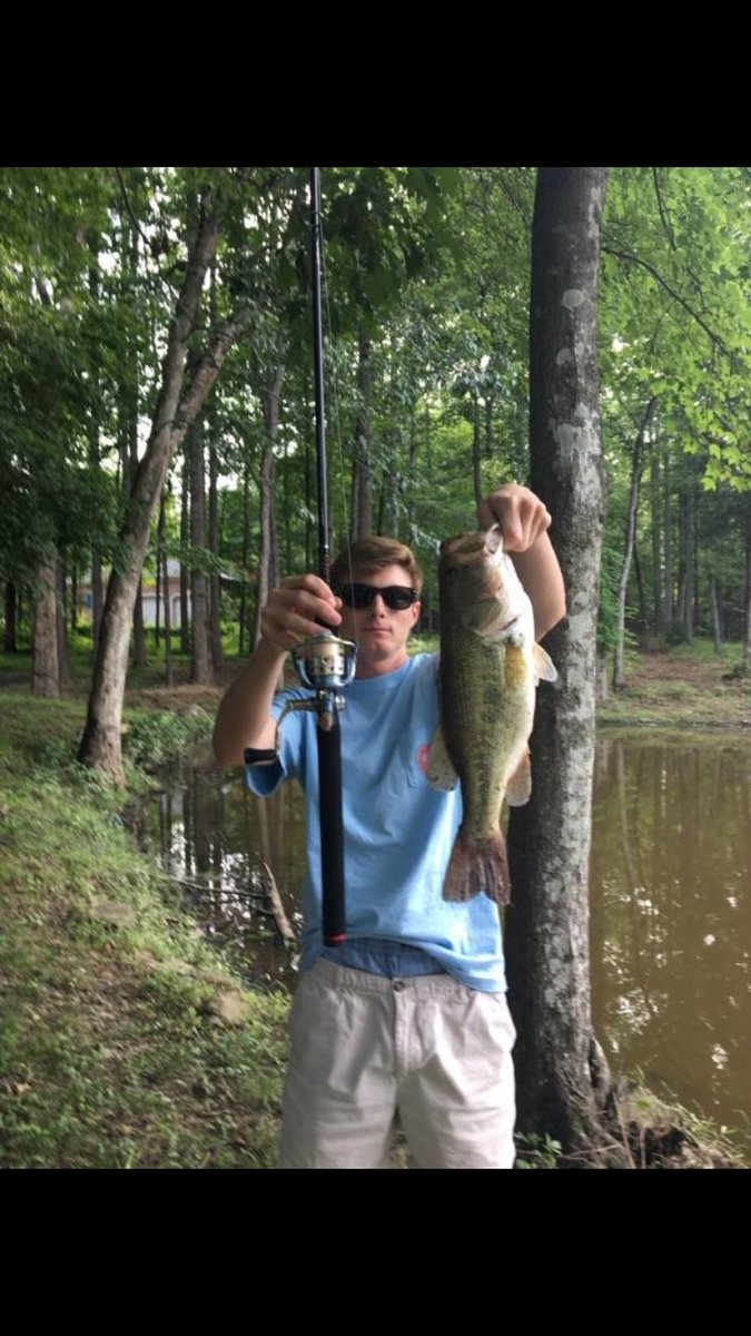 WHSbass's tweet image. Senior member, Kaison King, sizing up his new catch next to his rod and reel. #bassfishing #aquaticconservation