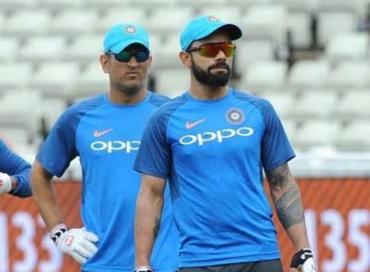 sagarcasm's tweet photo. Indian captain with Indian DRS captain. https://t.co/6EOgGI8l4H