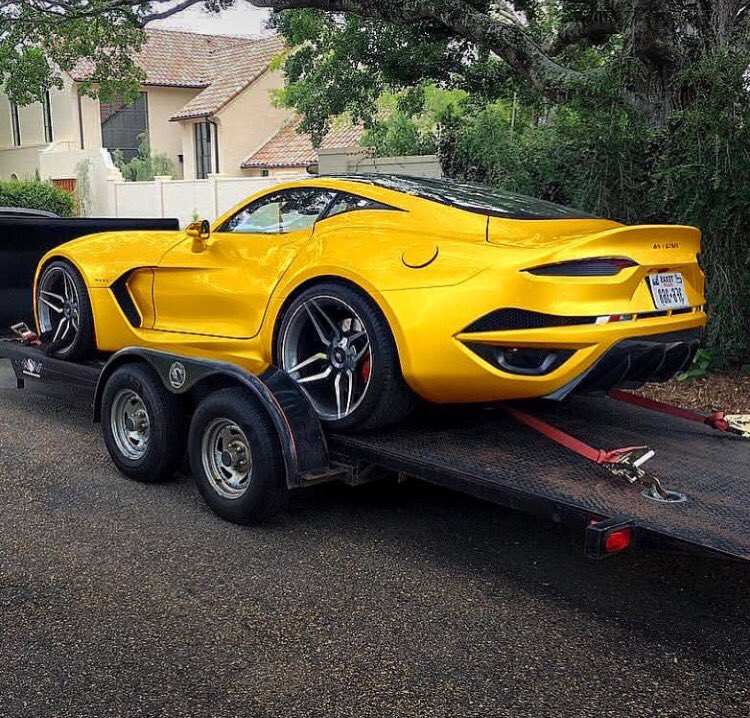 TrapShow_S's tweet photo. Fisker's new car is a reworked Dodge Viper but it's real ugly from the front😔 https://t.co/KbehAaAv0e