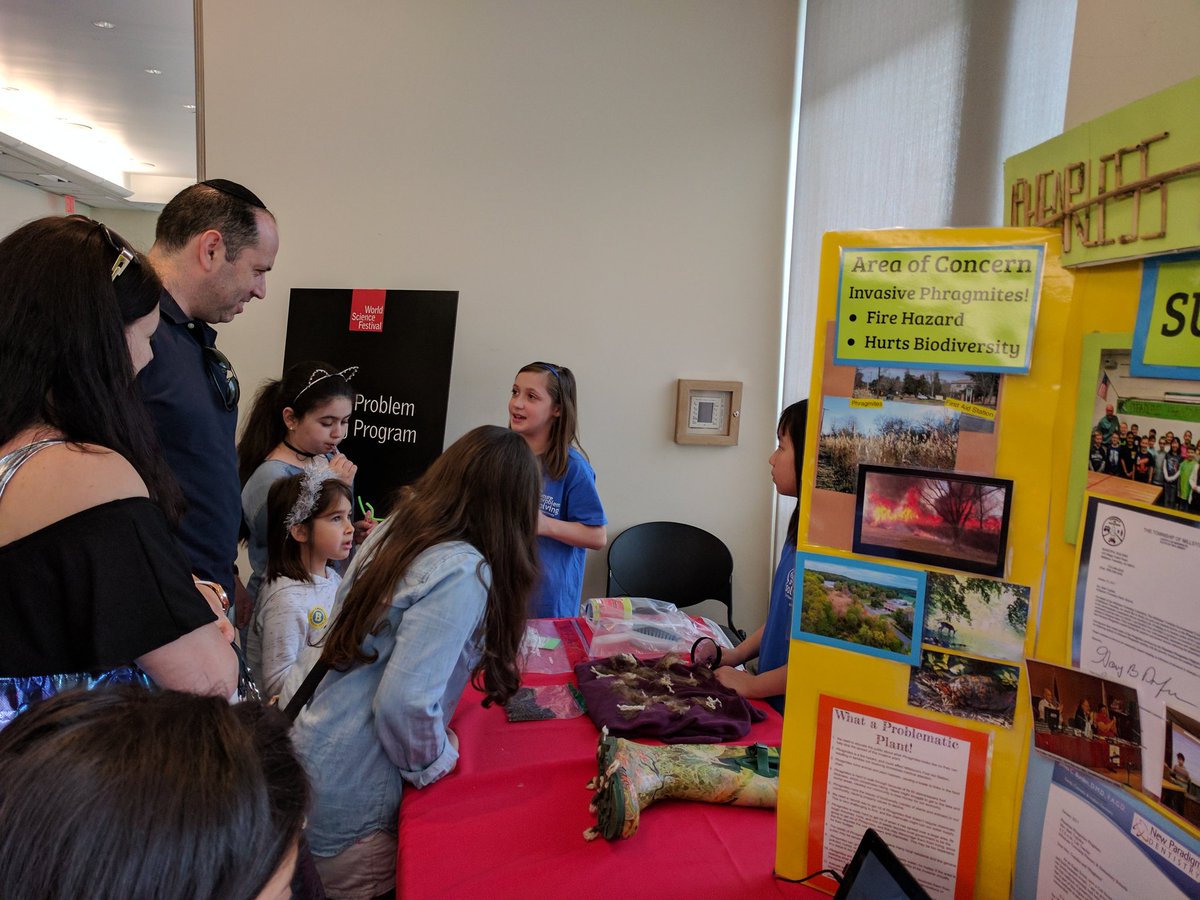 BTopink's tweet photo. Phearless Phragmites Phighters teaching World Science Festival-goers how to use Invase-Away kits to prevent spreading Phrag seeds. #glphrag https://t.co/hcGjeXgC1a