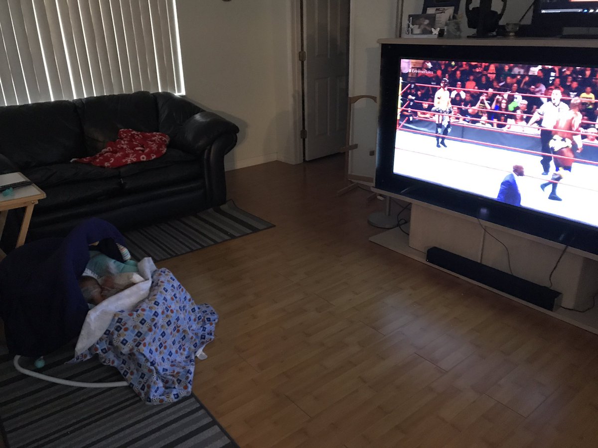 brookee_04's tweet photo. @WWE @RyanErbe and I are starting him young. #ExtremeRules2017 #ExtremeRules #firstPPV https://t.co/kc3yDH1A7y