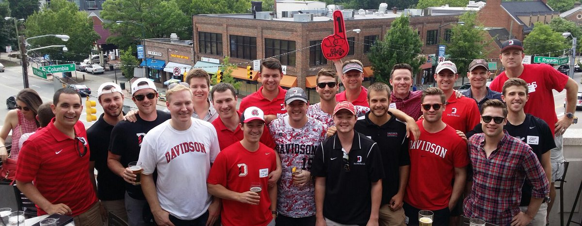 Former Davidson baseball players from class of '93 to class of '16 gather before Sunday's game at the alumni, parents and friends gathering in Chapel Hill.