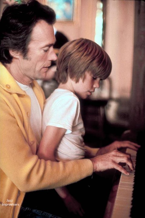 Happy 87th Birthday Clint Eastwood! .* *. *¨   Actor Clint Eastwood playing piano while son Kyle Eastwood sits ... 