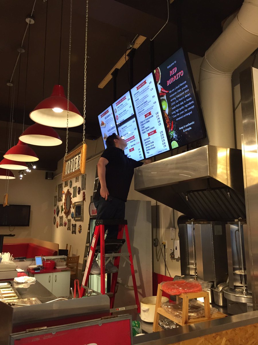SocialMiDisplay's tweet photo. Making some final tweaks for Red Burrito's new digital menu before opening! #vancouver #RobsonStreet #foodie #deliciousfood https://t.co/rbTP2jSMxy
