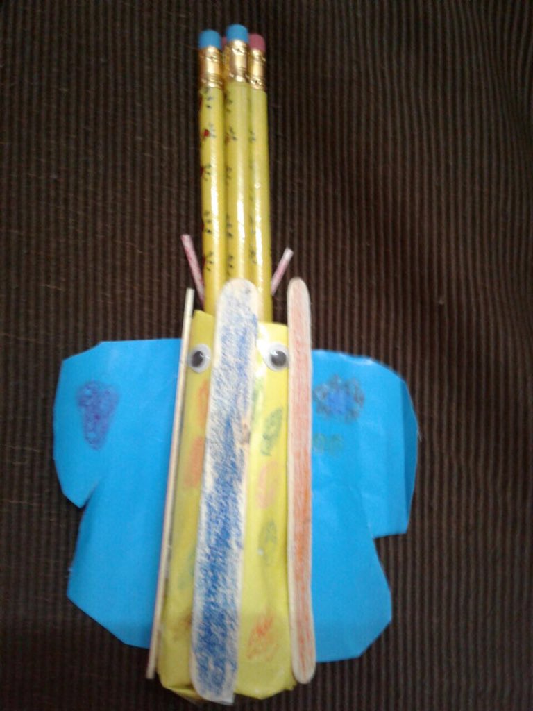 Aadvikas butterfly pencil holder made of paper cardboard and icecream sticks
