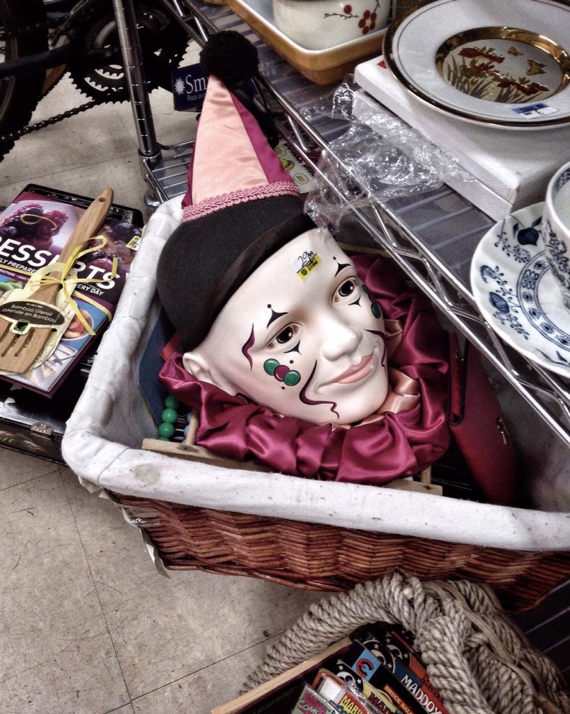 WooWork's tweet image. At the thrift store, this clown head costs $29.99 and a piece of your eternal soul.