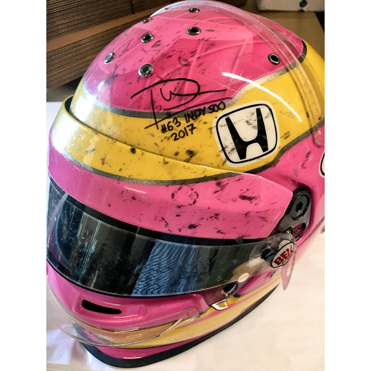 PippaMann's tweet image. Signed, headed to @AuctionCause tmrrw, before going on to the winner. Never gets easier to give these away! #Indy500 #IndyCar #BellAthlete
