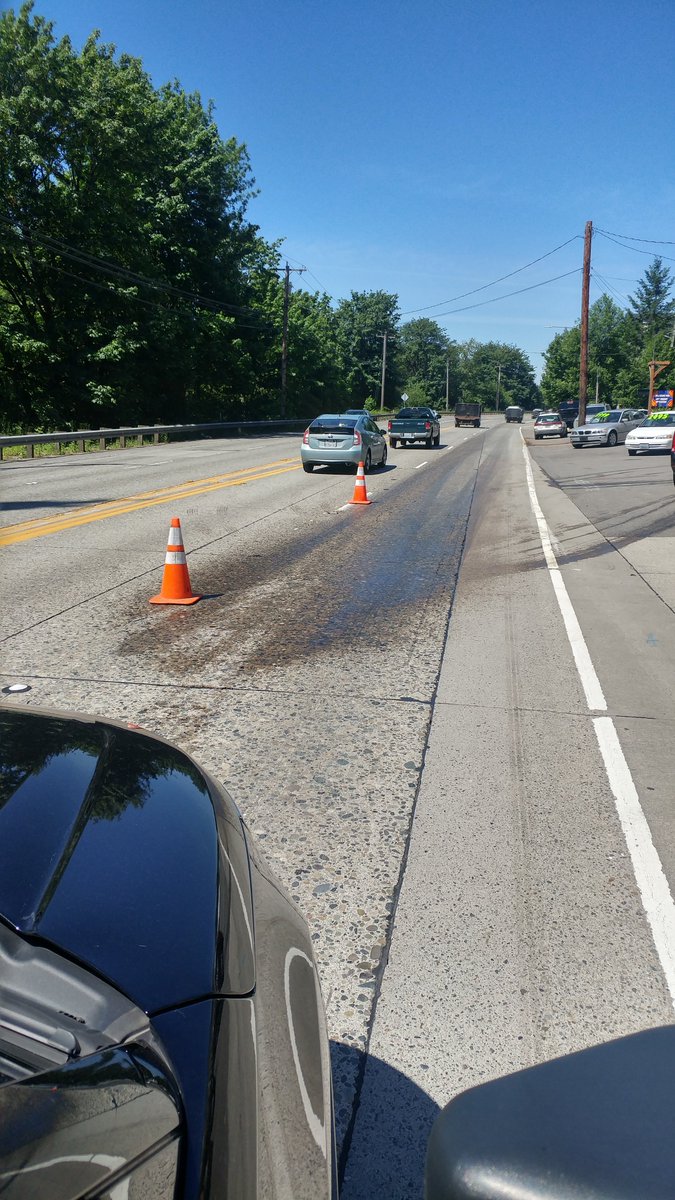 Hot days have you missing the icy roads of winter? We've provided an oil slick for you to reminisce. 1 lane WB 522 shut  by Kenmore boarder