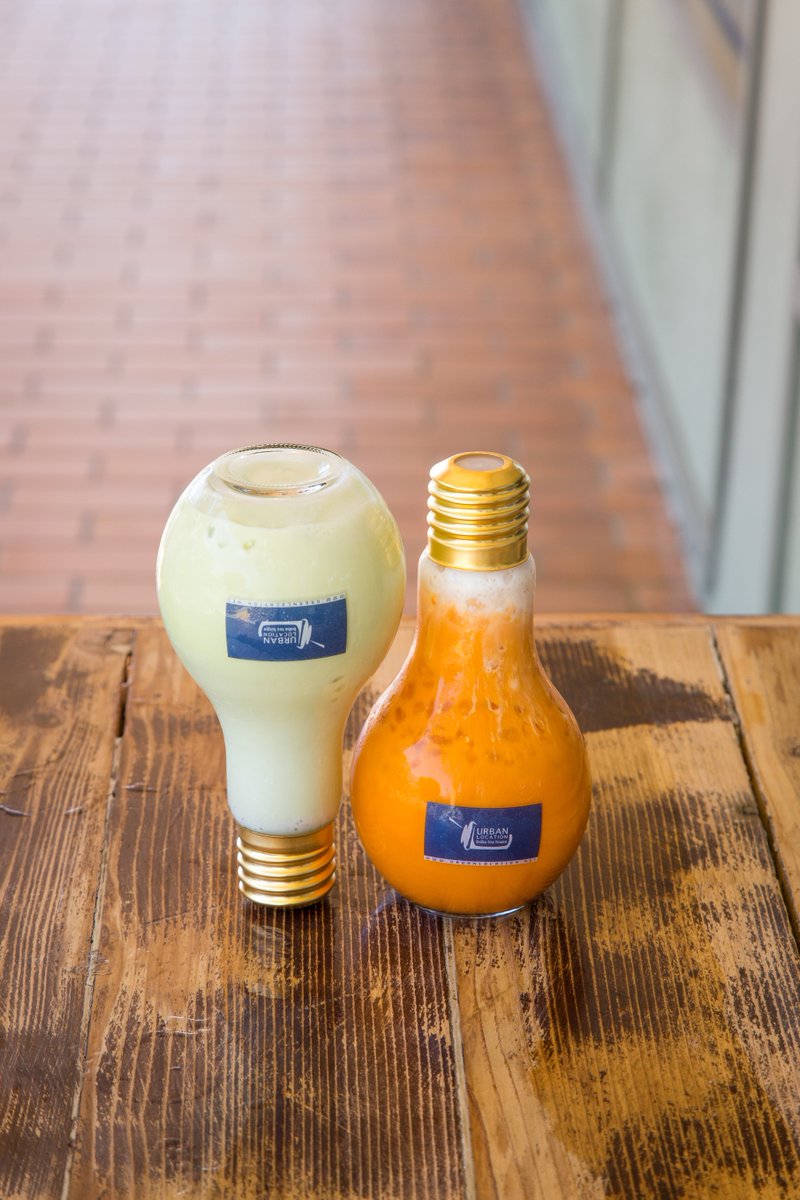 Our lightbulbs come with bottle caps to prevent spilling and to take cool photos like this 😎 #urbanlocation #ocfoodie #boba #thaitea #tea