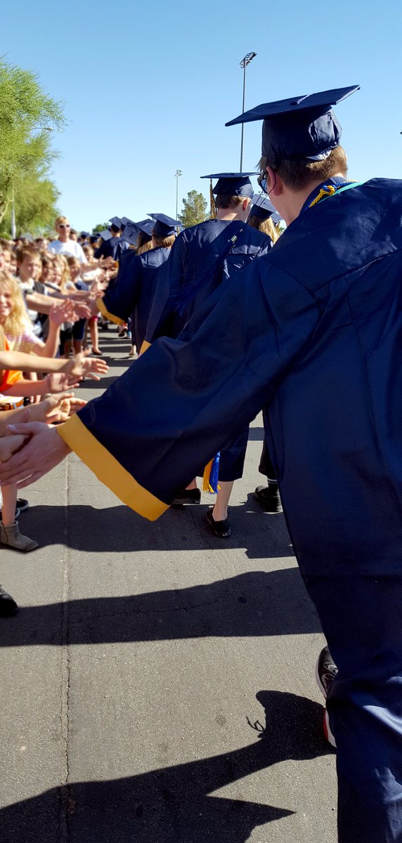 ClarkCountySch's tweet photo. The annual @boulder_hs grad walk took place this morning. Congrats to all the seniors getting ready to turn their tassels later this week. https://t.co/s9KmR3yvxi
