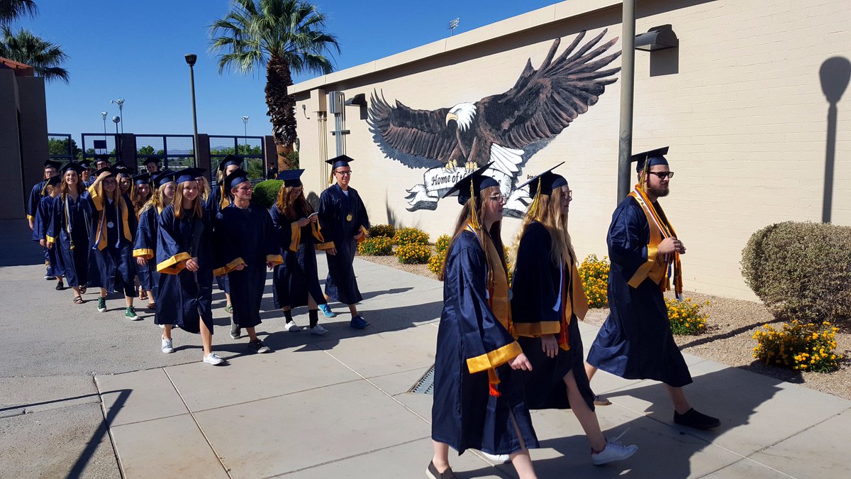ClarkCountySch's tweet photo. The annual @boulder_hs grad walk took place this morning. Congrats to all the seniors getting ready to turn their tassels later this week. https://t.co/s9KmR3yvxi
