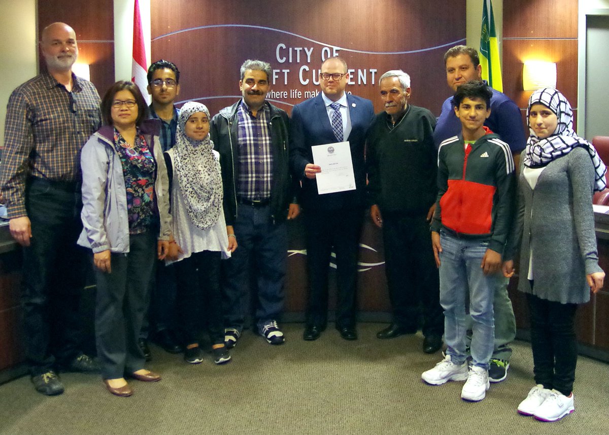 PrairiePostSC's tweet photo. The @City_SC proclaimed June 11-17 as #RefugeeAwarenessWeek. Council  meeting attended by members of refugee family living in #SwiftCurrent. https://t.co/dx3M243JBL