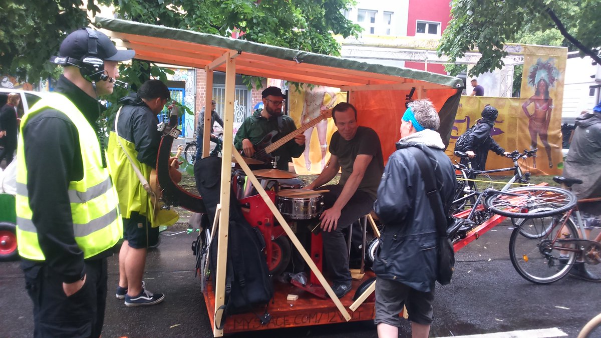 radentscheid's tweet photo. It rained on our parade at Karnival der Kulturen-but we still got theatrical and demonstrated what happens when cyclists and cars mix #kdk17 https://t.co/FVtEeHT1pS