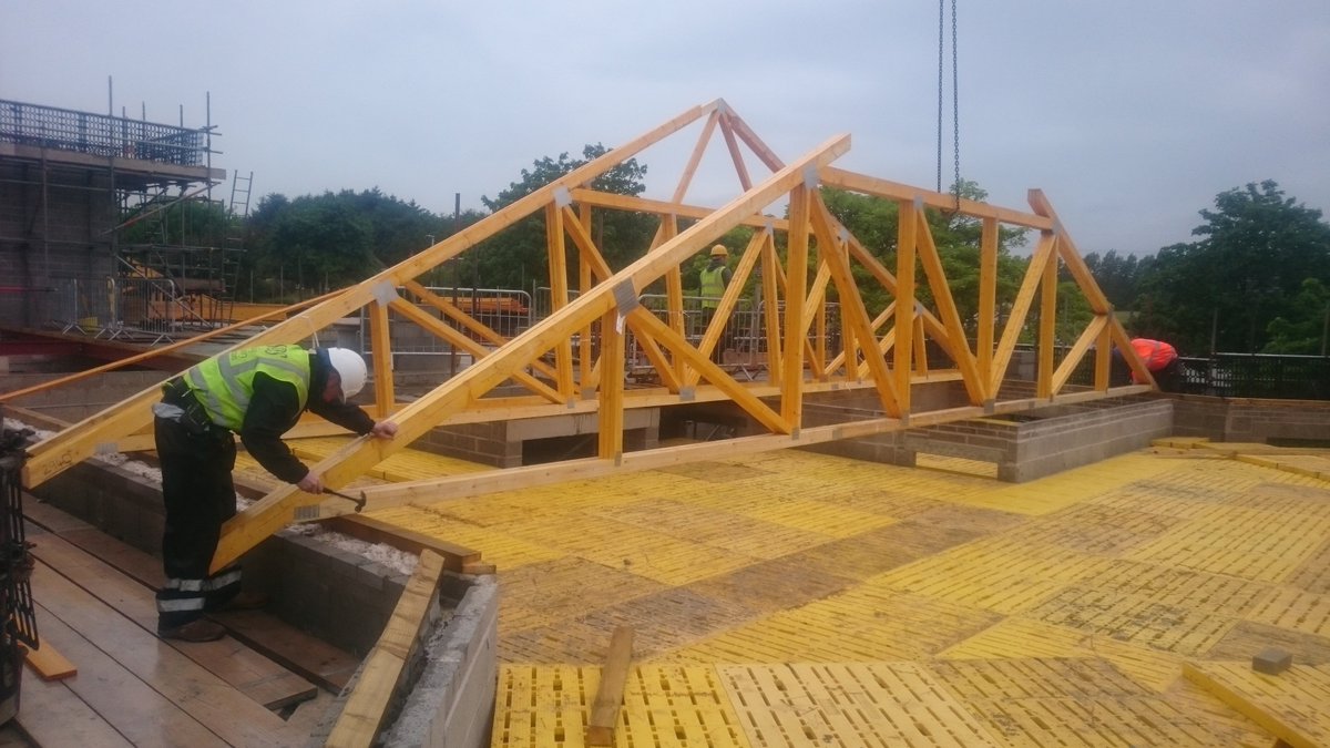 WalterThompsonL's tweet photo. Roof truss installation has commenced at Huddersfield, working together with Frame-Tech Structures #rooftruss #roof #trusses #Frametech https://t.co/llAZcW4JVf