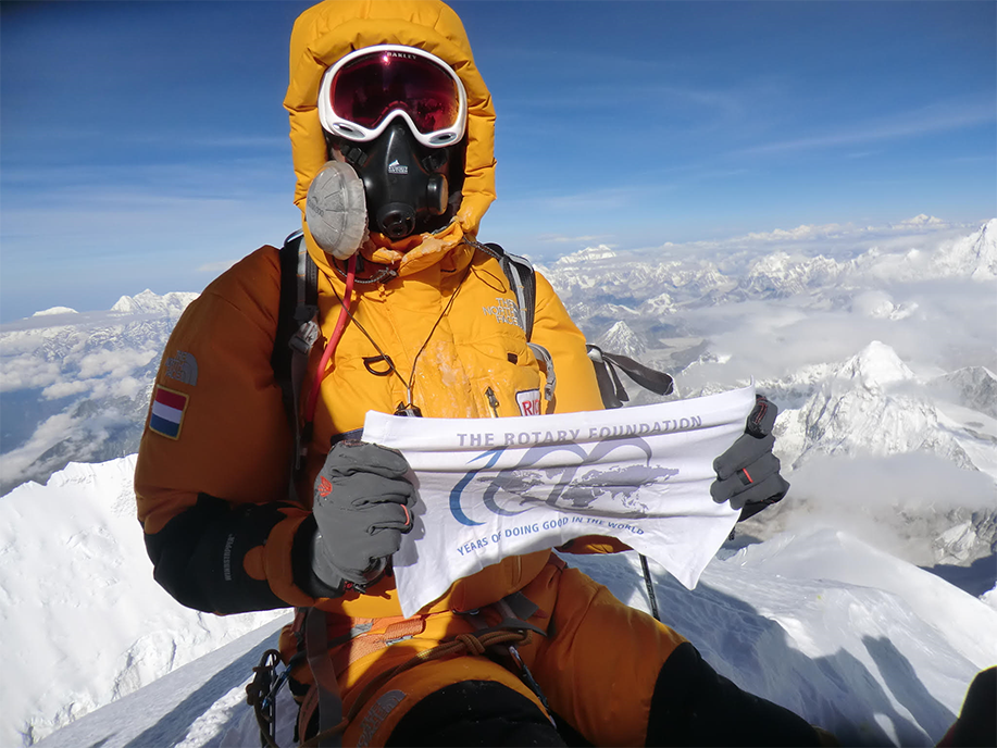 JohnHewko's tweet photo. Rotarian Olivier Vriesendorp holds The Rotary Foundation's Centennial banner atop Mt. Everest to celebrate Rotarians doing good in the world https://t.co/bjnIlARikU
