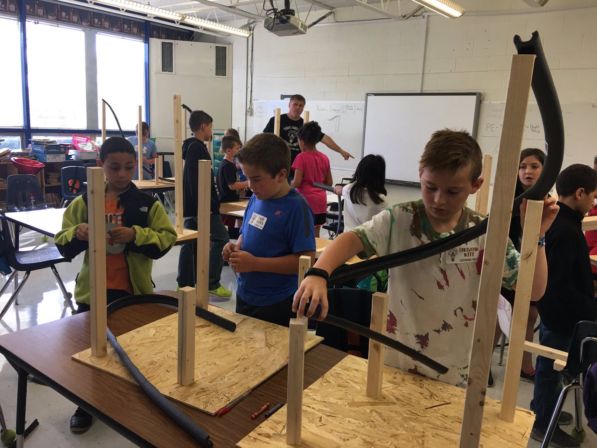 Ashland_Schools's tweet photo. Roller coaster construction is in full swing at Project Ignite Camp #AISD #AshlandCTC #ProjectIgnite #SummerStemLearning https://t.co/hYurEkVtdA