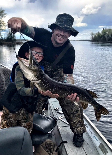 WildernessNorth's tweet photo. A beautiful father-son moment! Matt and his dad with their 36" pike! #FamilyFun #GoWildGoNorth #Pike https://t.co/UtuMEWtBfq
