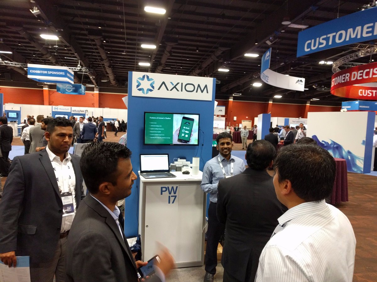 AxiomTechGroup's tweet image. Axiom&apos;s Chatbot has been a huge hit thus far at #PegaWorld If you haven&apos;t already done so, stop by booth #16 to see for yourself #Chatbot