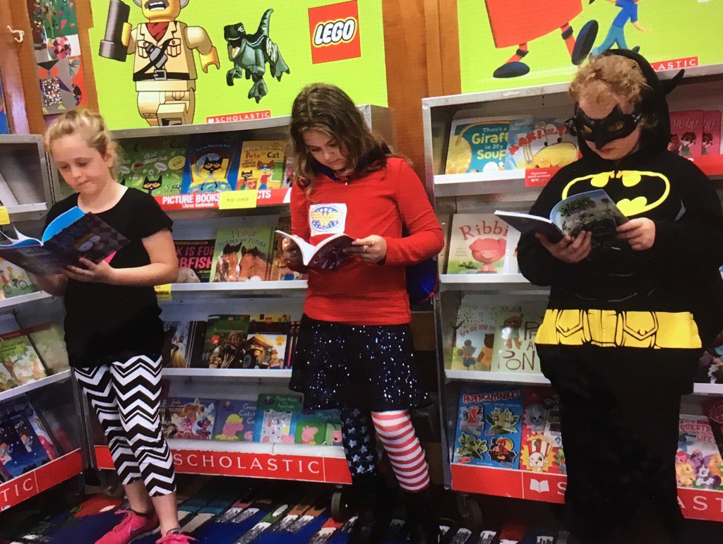SchLibRI's tweet photo. RT @guiteraslibrary Superheroes read! @Scholastic #ReadWhatYouWant #BookFair #2017Reading&ArtsWeek #Guiteras https://t.co/0USRkYFkQ6