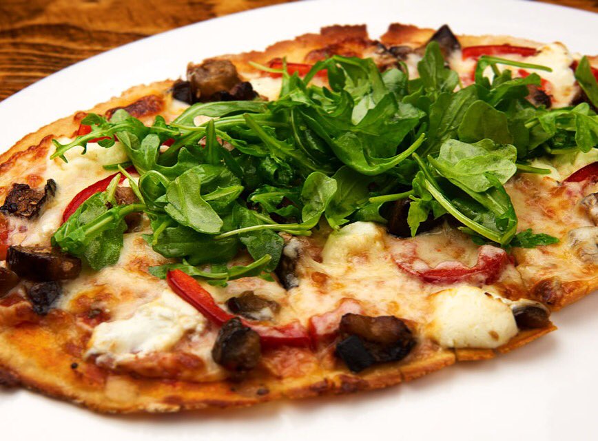 Are you ready for #lunch yet? #eatthewild with our #caprino #pizza 
#greens, #eggplant &amp; #goatcheese to spice up your day. #eatdrinkwild