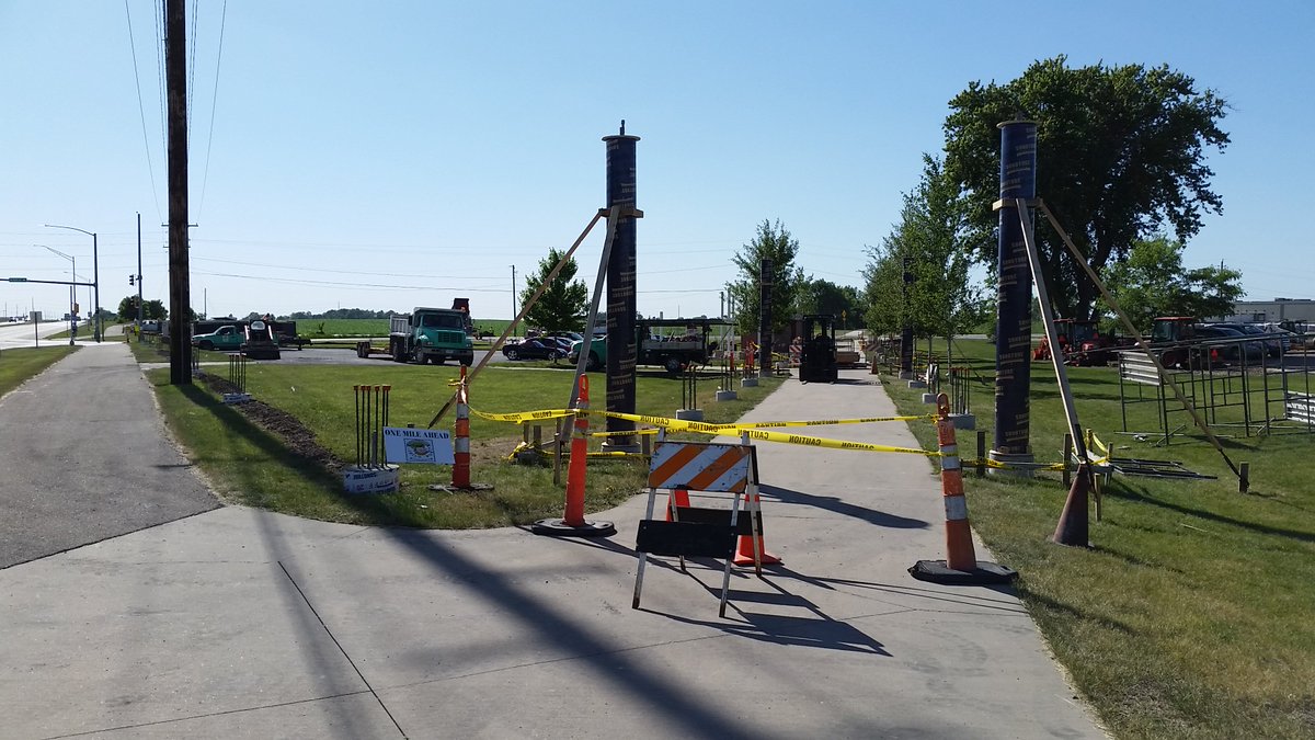iowabiketrail's tweet photo. The "Waukee Railroad Pergola -- in the shadow of the rails" is going up! Jim Miller's photo shows progress at the RRVT trailhead in Waukee. https://t.co/lQ0dQDV2UY