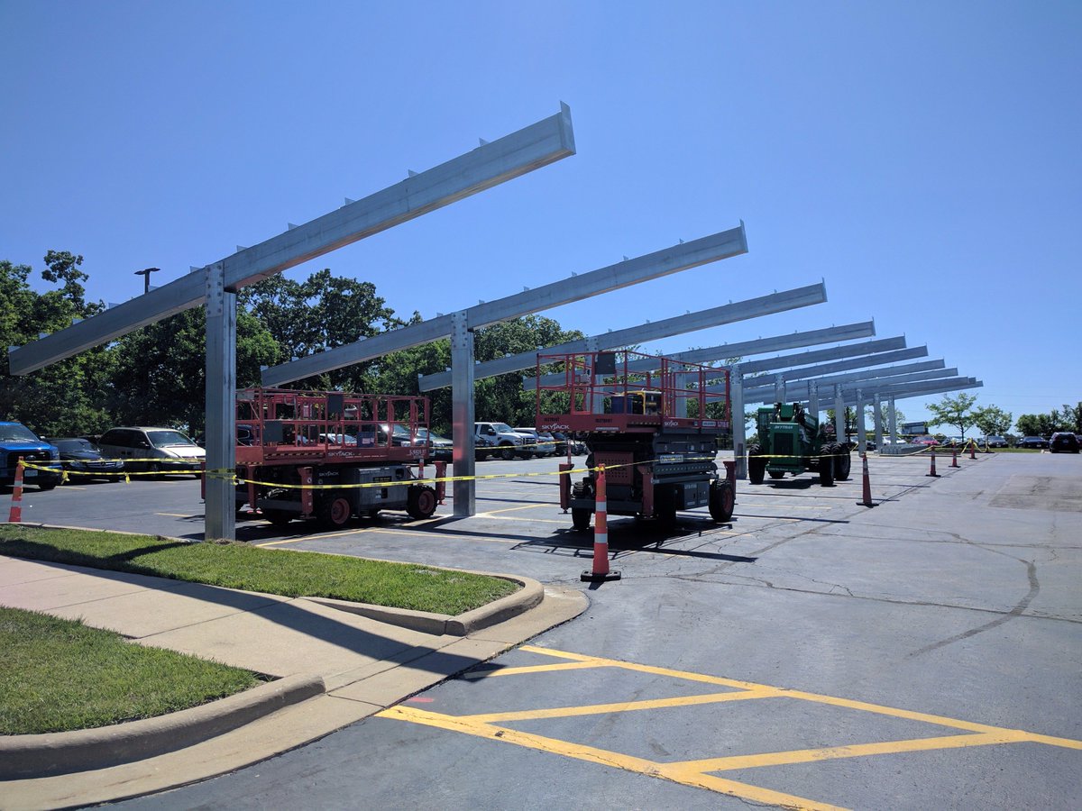 Solar canopies going up soon at #Mastercard STL campus parking lot! ☀️