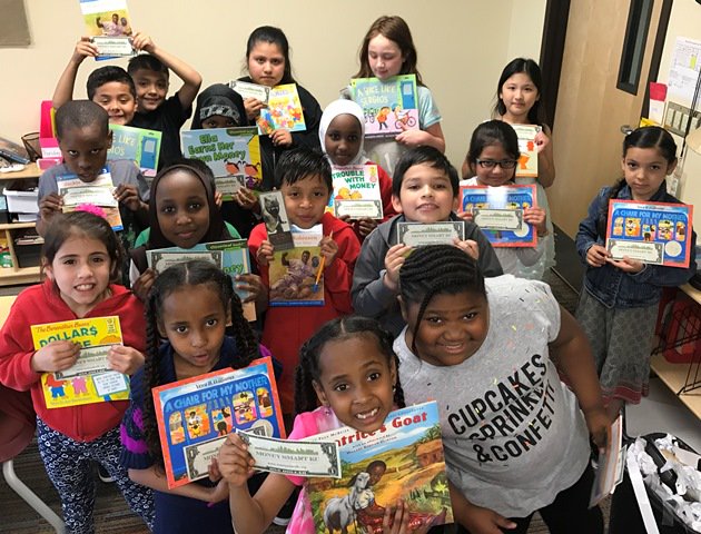 Students learn to save and receive free books.....cb staff serves at Ronald McDonald House and more in this cb news. bit.ly/15zQiM2