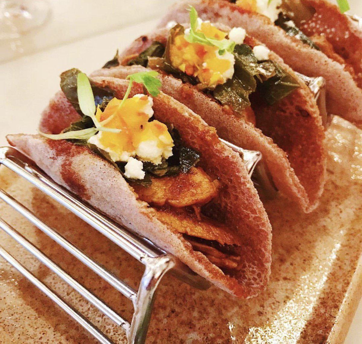 Change up your #TacoTuesday routine and indulge in our Injera Tacos. 📸: <a href="/cupcakescaviar/">Jiselle</a>