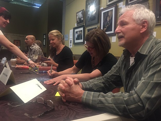 Signing at Bay Area Book Festival. Yes, that's @CorneliaFunke on my right, and Eric to my left.