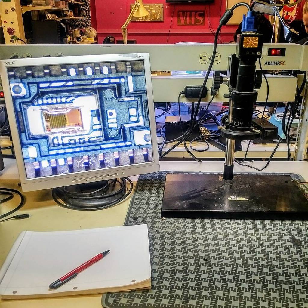 VHS's tweet photo. Microscope coming in handy for some chip reverse engineering #microscope #pcb #asic #decapping #silicon #reverseen⦠https://t.co/yVgr3SJCNK https://t.co/oj55w5fMM7