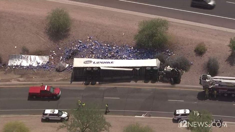 NOW: A truck carrying Bud Light has spilled over the US60 ramp to 101 SB. LIVE: 12ne.ws/live2