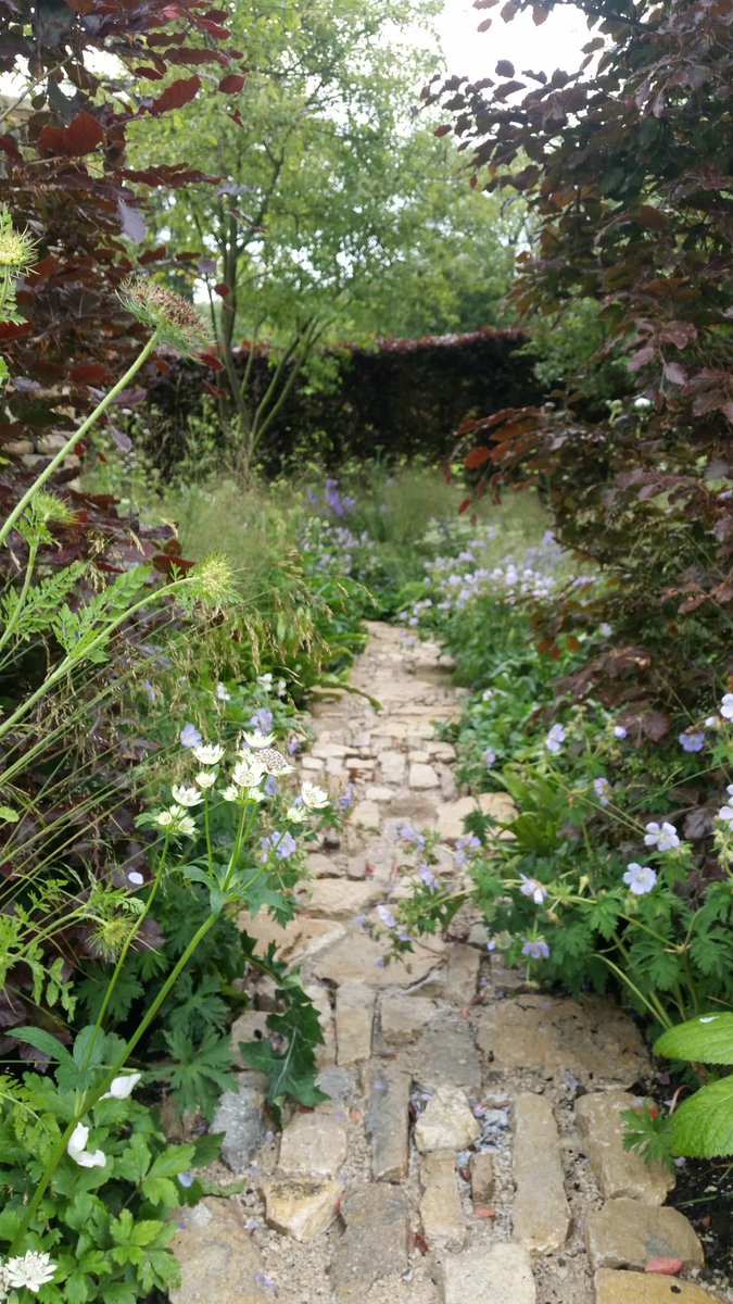 LifeandSoil's tweet photo. Even in the rain this path in @ovens_sam @Wedgwood_UK  @The_RHS #Chatsworth was looking magical. Well deserved gold Sam! https://t.co/UrgwD8eGBV