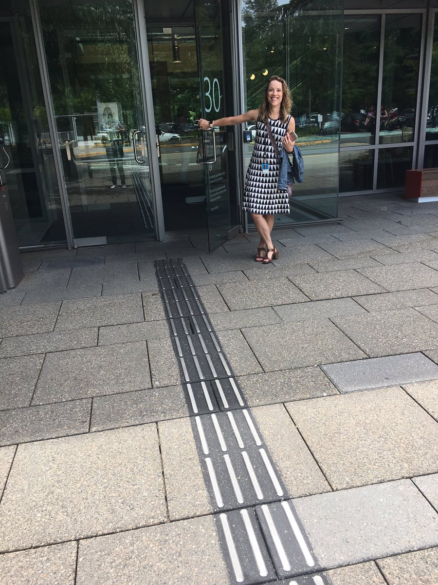 jennylayfluffy's tweet photo. Simple things matter.. tactile strips in new @Microsoft buildings to guide from front door to curb - modeled by Kerrie on our #a11y team :) https://t.co/CQVVfWOQCX