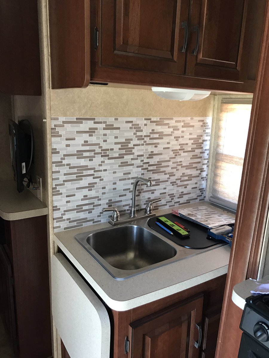 chancewleonard's tweet photo. Day 2 of RV Hack - adding a backsplash and reupholstering our window treatments. #couplesproject https://t.co/Nw3DKGO39h