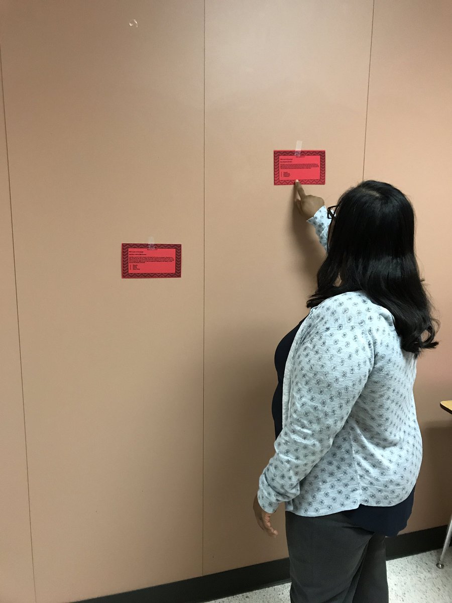 MMcCullum_iLead's tweet image. Mrs. Carey, pictured modeling what to do, has her students up and moving to determine the genres of posted passages. 🤘🏾#SummerSchoolLearning