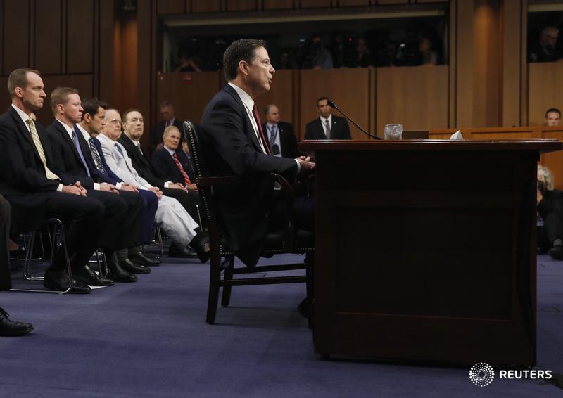 Reuters's tweet photo. LIVE: Comey says Trump did not order him to let the Flynn investigation go, took Trump's words as a direction https://t.co/HJvqjRNtT8 https://t.co/Qk53nSno9S