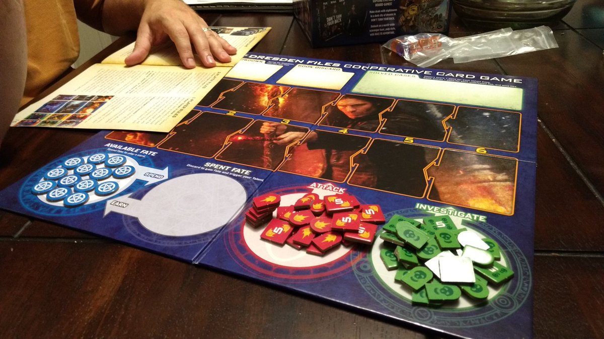 jeankoranda's tweet photo. Playing the new Dresden card game, thanks to @missionksgames b/c the geek runs deep in our house. #Fuego #JimButcher https://t.co/FDjPrsLyfR