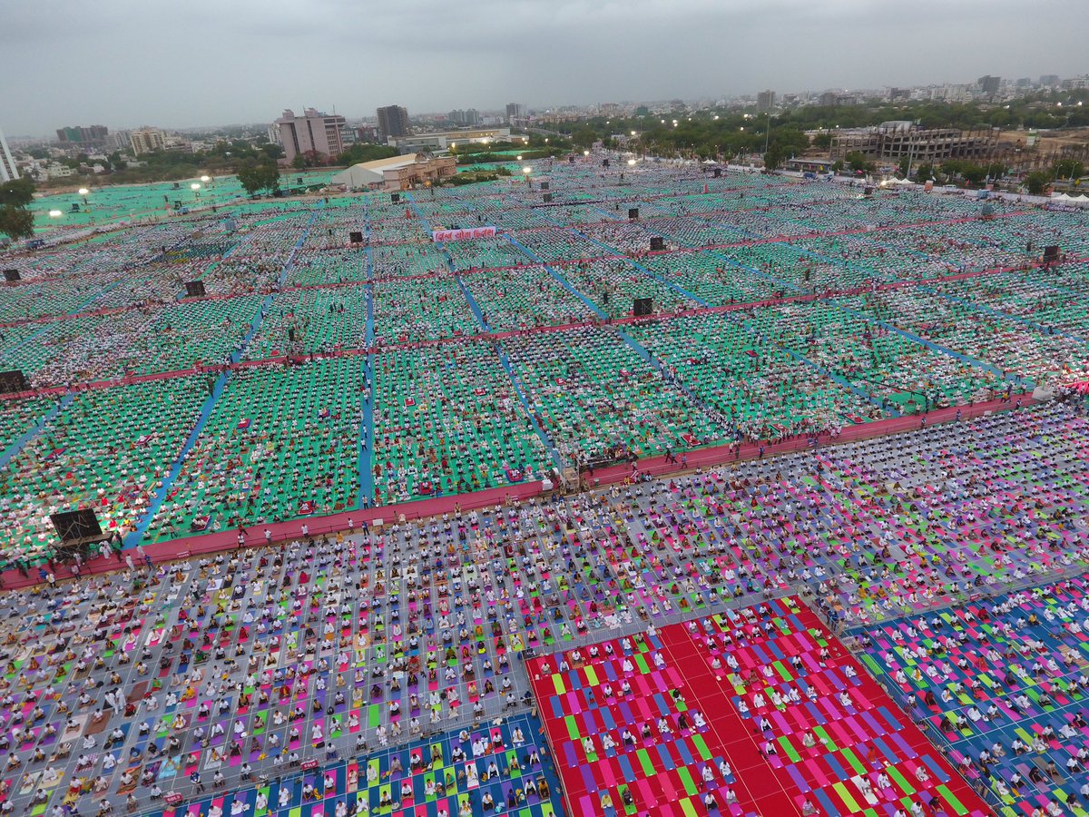 AmitShah's tweet photo. Amazing view of GMDC Ground,Ahmedabad. Congrats to @yogrishiramdev ji and CM @vijayrupanibjp &amp; thanks to all the participants. #YogaDay2017 https://t.co/EqBpfWJiD6