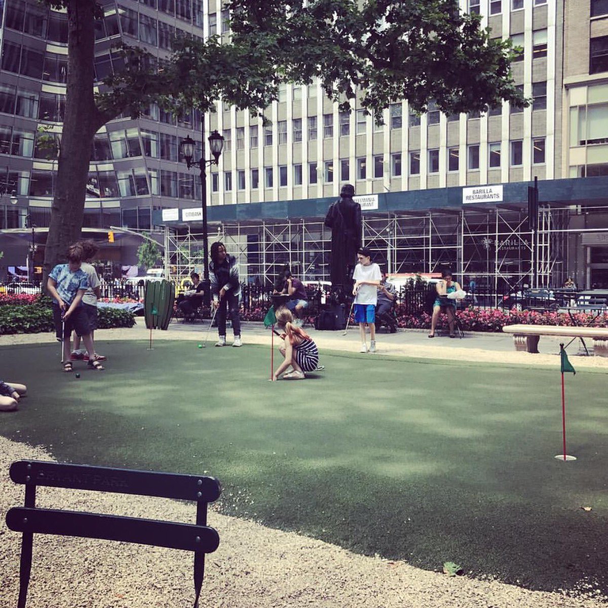 Explorerz's tweet photo. @bryantparknyc Surprise pop-up mini golf enjoyed by @Explorerz on their well deserved lunch break after a morning of practicing Magic! https://t.co/FAUlZ7TQpU