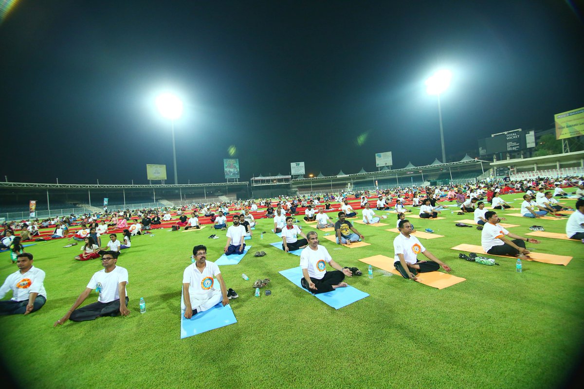 timesofindia's tweet photo. #InternationalYogaDay | Glimpses of Yoga day celebrations at Sharjah Cricket Stadium in UAE

https://t.co/pLcXraAV8f https://t.co/BSWl3xKtU4