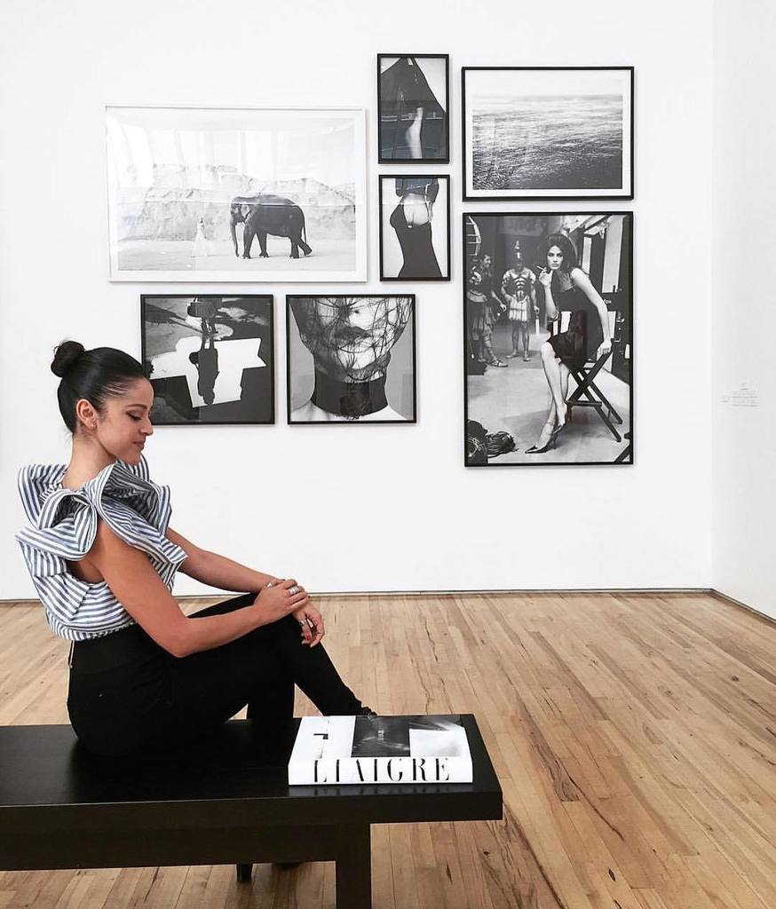 TheseFineWalls's tweet photo. Great shot of @brokenspanish_ with our pop up gallery wall. #thesefinewalls #tfwpopup https://t.co/9qM4Q3E5Jc