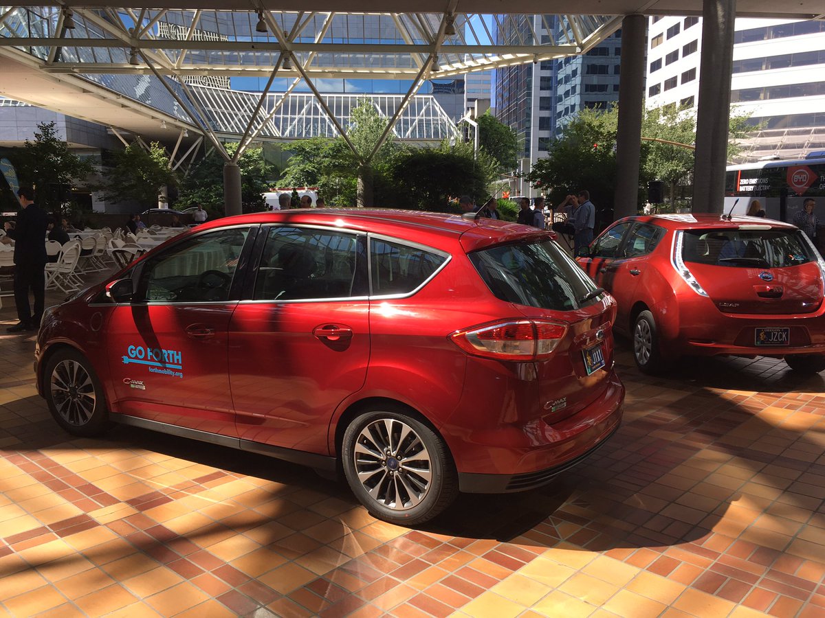 ForthMobility's tweet photo. Two of the cars that are available for test drives at the #GoForth Electric Showcase are on display in the Plaza today at #EVRM10 https://t.co/KRAYPZr791