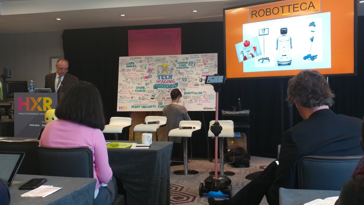 careDOTcoach's tweet photo. Mike @chartacloud shows off one of the most advanced telepresence robots available, from @OhmniLabs #HXR2017 "Tech for Aging Population" https://t.co/KWLqKBNgPY