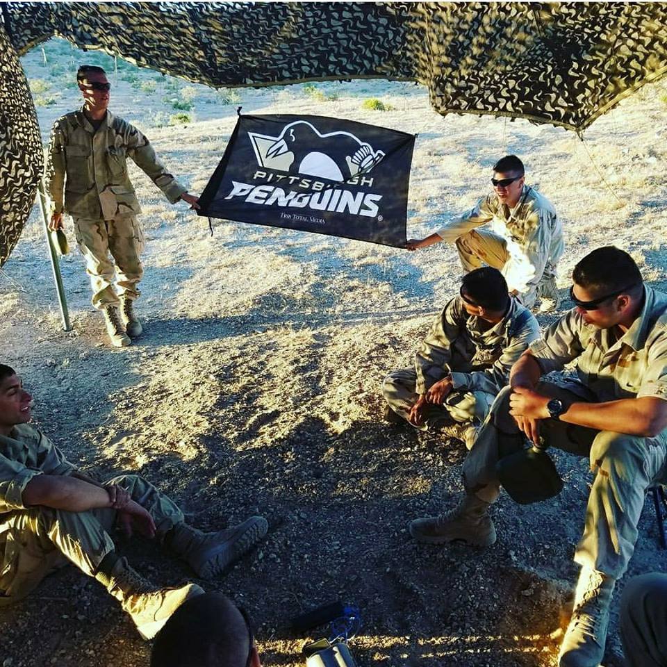 Teams_4_Troops's tweet photo. #LATEPOST - One of our founders, Josh, &amp; his crew at ___. I wonder who they were rooting for in the Stanley Cup playoffs. @penguins @NHL https://t.co/Q53Ae32nKr