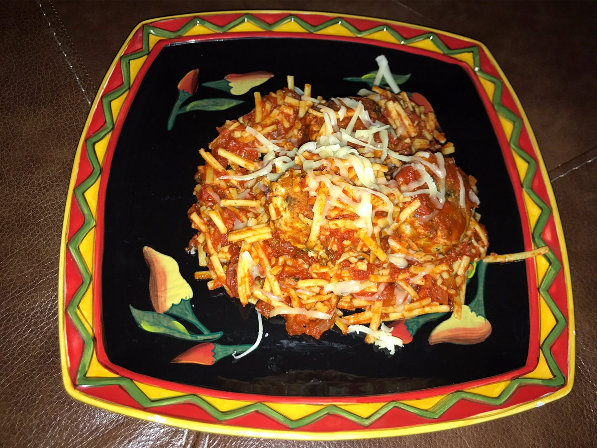 Brown rice pasta with homemade organic tomato sauce and turkey meatballs.