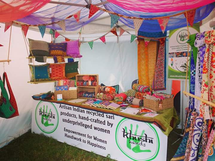 The <a href="/KhushiHands/">Khushi Hands</a> stall at @GlastoFest is looking beautiful! 🇮🇳💚 #Glastonbury #KhushiGlasto2017 #festival #artisan #Indian #recycled #sari