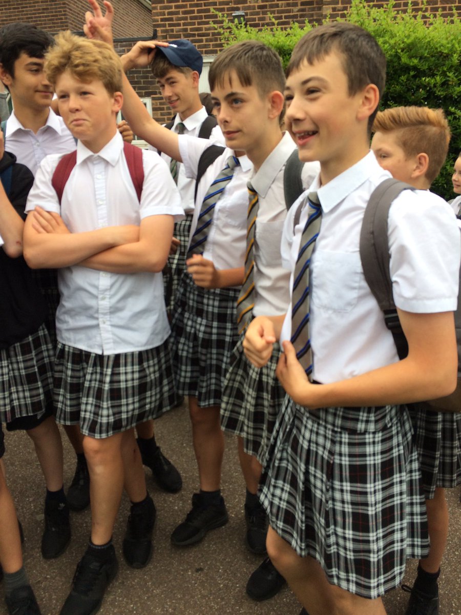 Boys at Isca Academy in Exeter wear skirts to school in protest at not being allowed to wear shorts in hot weather.