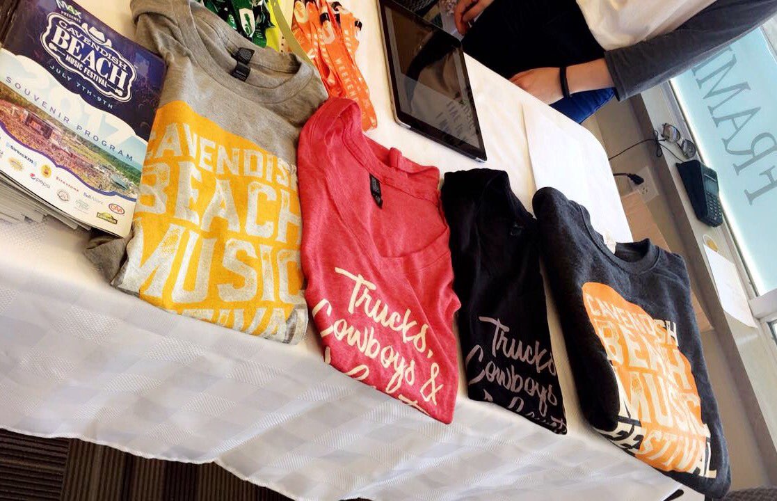 CavendishFest's tweet photo. We're in #Fredericton at @VogueOptical from 12pm- 7pm today! We've got merchandise &amp; #beachbands of course! #cbmf2017 https://t.co/PMF6VJROpg